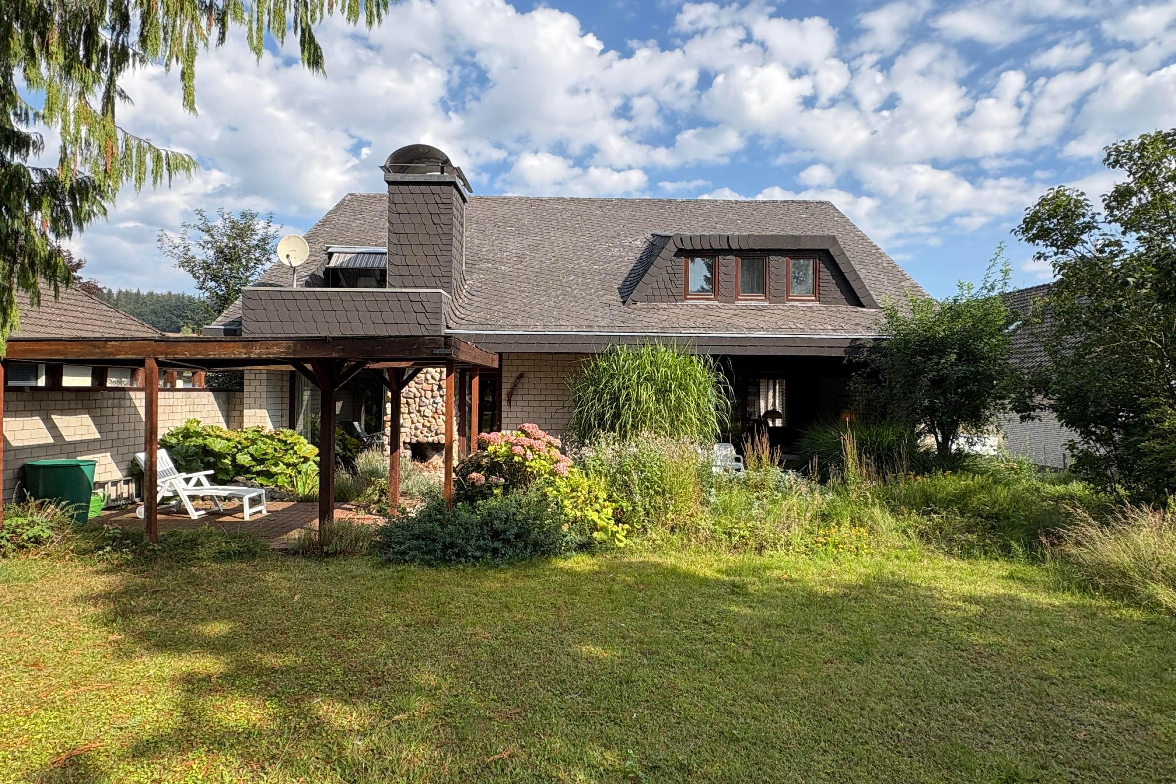 Großartiges Architektenhaus mit Einliegerwohnung in bevorzugter Wohnlage!